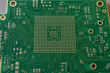 Close view of a circuit board with a dense BGA pad field and fine fanout traces