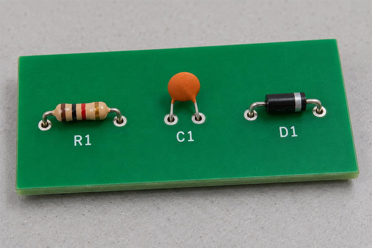 R1 resistor, C1 capacitor and D1 diode on a component identification coupon, AI illustration