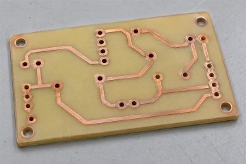 Sparse copper routing on a single-sided teaching PCB, AI illustration