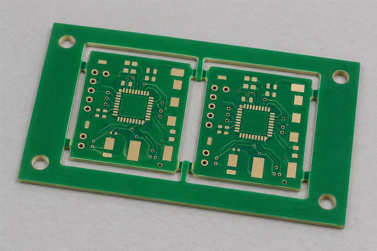 Illustrative PCB panel with tooling holes in its handling rails